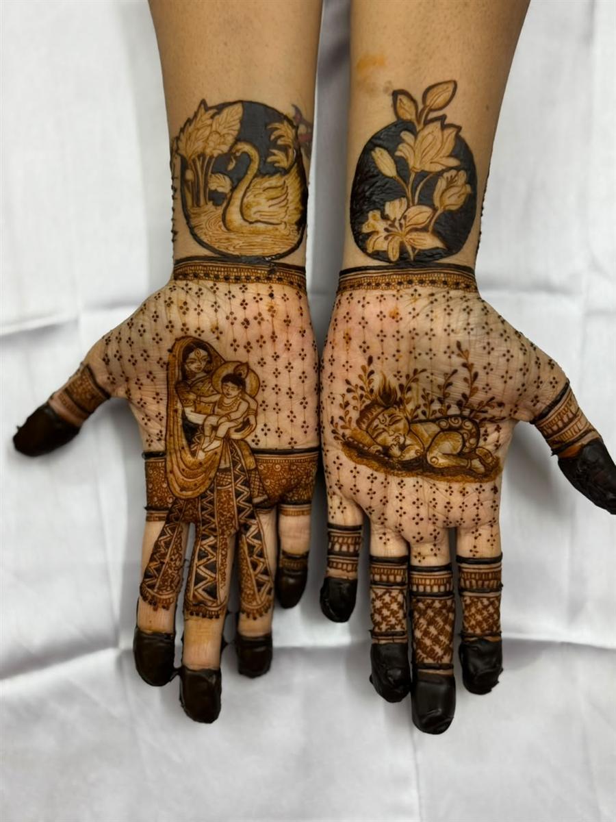 Mother and baby Krishna themed mehandi hands