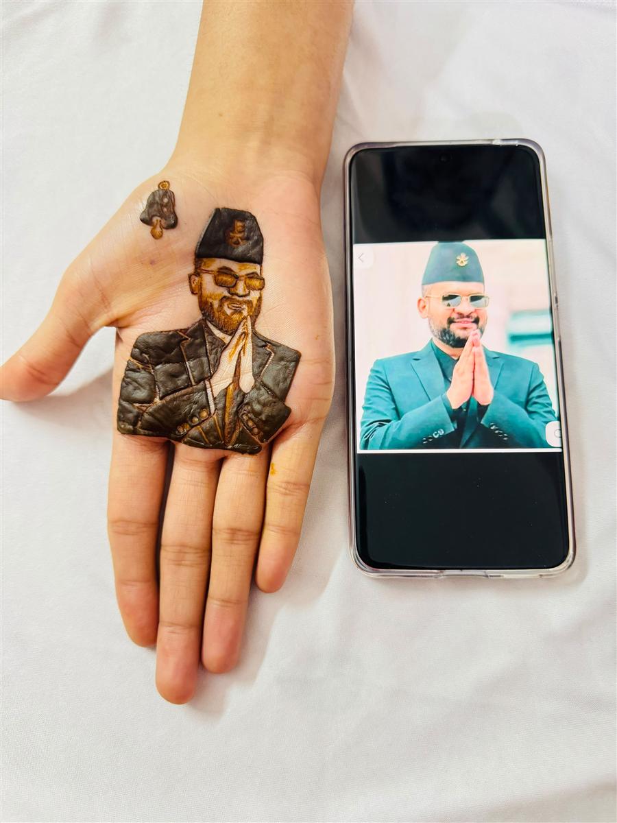 Man in Nepali topi and daura recreated in henna
